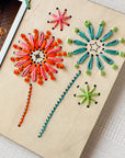 Embroidered instant photo frame with firework decoration.